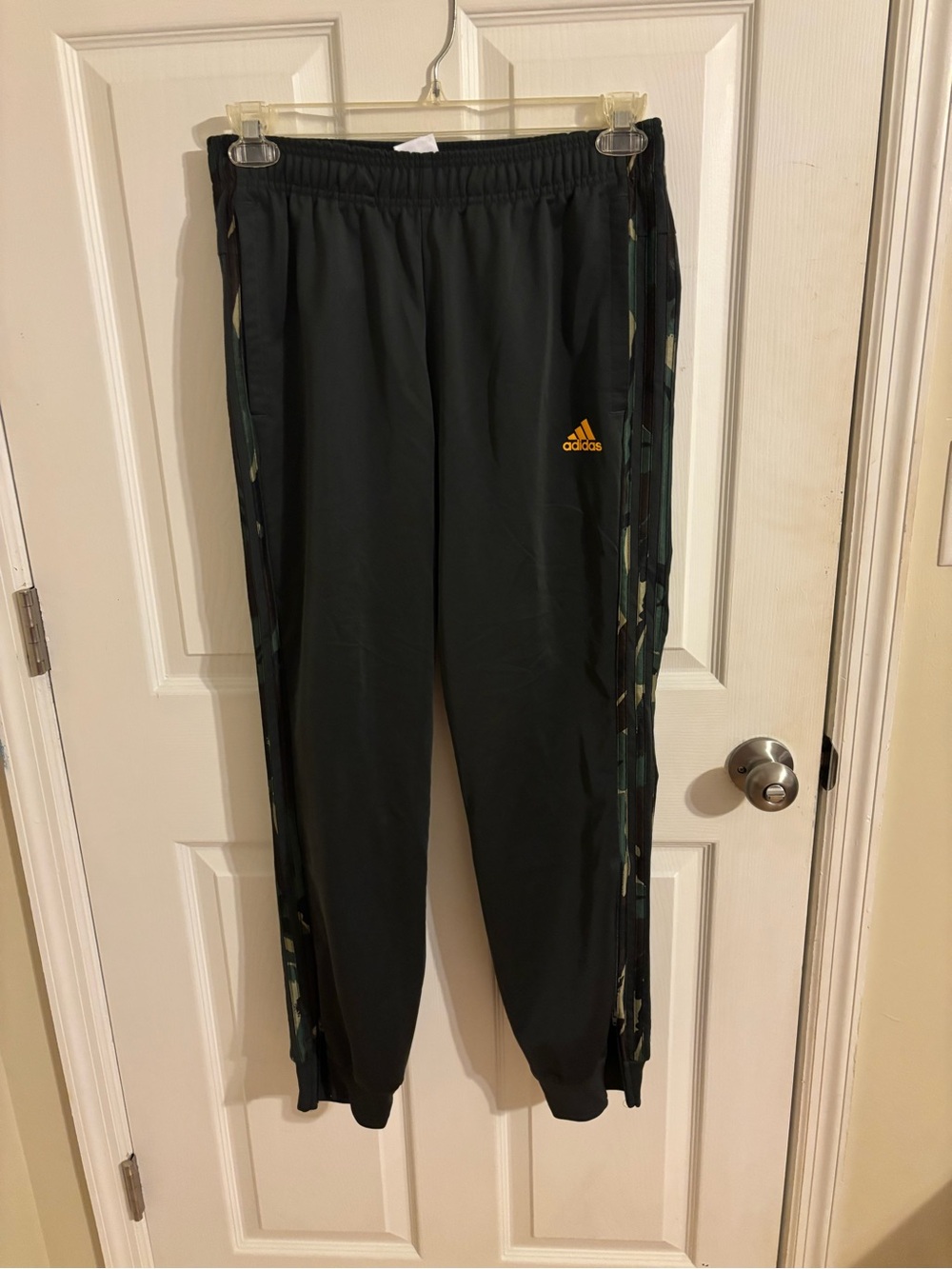 adidas mens Black Sweatpants with Camo Side Panels and Gold Logo